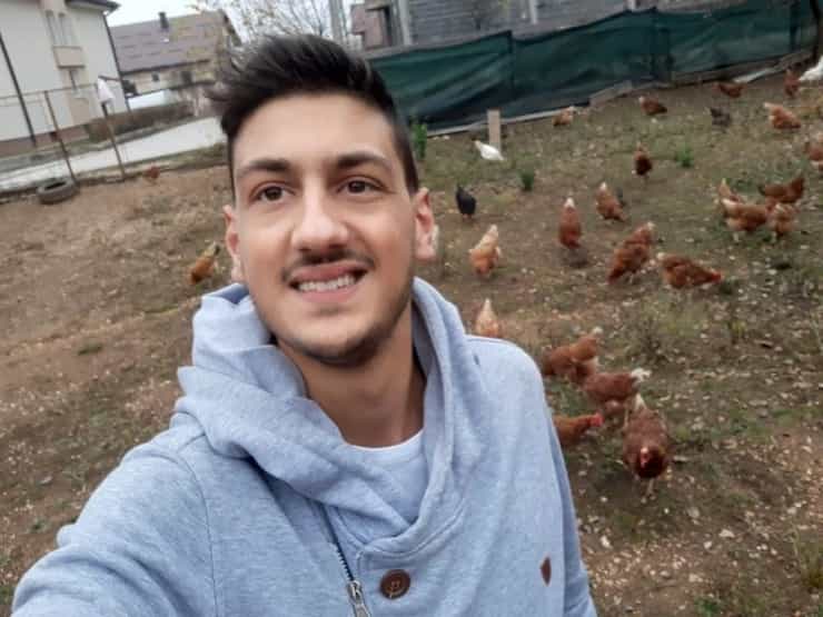 student with chicken